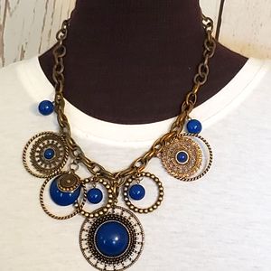 Premier Designs bronze tone necklace with circle charms and blue beads